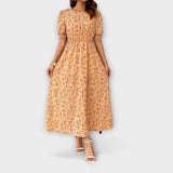 Amelia – Rochie cu Decolteu Rotund și Model Floral