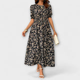 Amelia – Rochie cu Decolteu Rotund și Model Floral