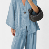Eli set oversized cu top cu decolteu în V și pantaloni drepți