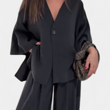 Eli Compleu oversized cu top cu decolteu în V și pantaloni drepți