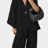 Eli Compleu oversized cu top cu decolteu în V și pantaloni drepți