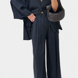 Eli Compleu oversized cu top cu decolteu în V și pantaloni drepți